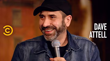 Dave Attell performing on tour